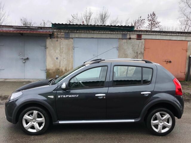 Серый Рено Сандеро, объемом двигателя 1.6 л и пробегом 125 тыс. км за 5500 $, фото 6 на Automoto.ua