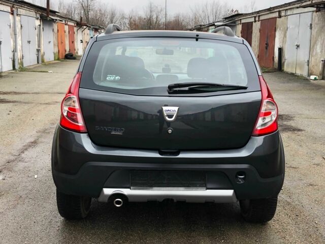 Серый Рено Сандеро, объемом двигателя 1.6 л и пробегом 125 тыс. км за 5500 $, фото 4 на Automoto.ua