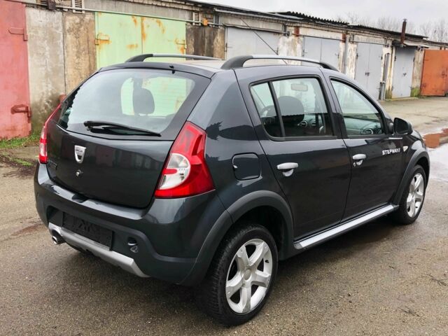 Серый Рено Сандеро, объемом двигателя 1.6 л и пробегом 125 тыс. км за 5500 $, фото 3 на Automoto.ua