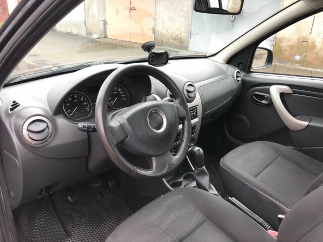 Серый Рено Сандеро, объемом двигателя 1.6 л и пробегом 125 тыс. км за 5500 $, фото 12 на Automoto.ua