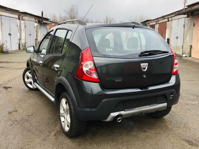 Серый Рено Сандеро, объемом двигателя 1.6 л и пробегом 125 тыс. км за 5500 $, фото 8 на Automoto.ua