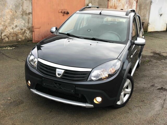 Серый Рено Сандеро, объемом двигателя 1.6 л и пробегом 125 тыс. км за 5500 $, фото 9 на Automoto.ua