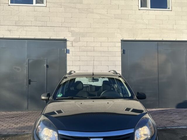 Серый Рено Сандеро, объемом двигателя 1.6 л и пробегом 180 тыс. км за 6599 $, фото 2 на Automoto.ua