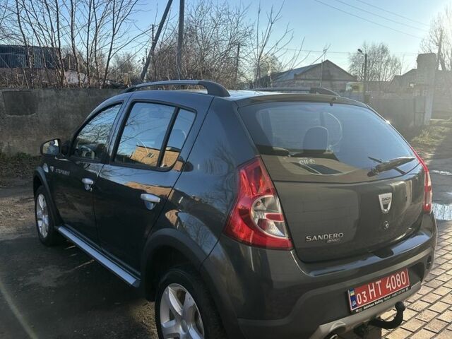 Серый Рено Сандеро, объемом двигателя 1.6 л и пробегом 180 тыс. км за 6599 $, фото 4 на Automoto.ua