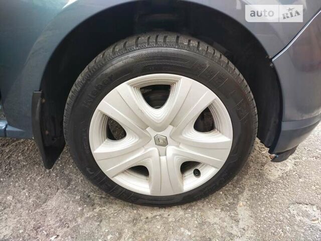 Синий Рено Сандеро, объемом двигателя 1.39 л и пробегом 261 тыс. км за 5200 $, фото 21 на Automoto.ua