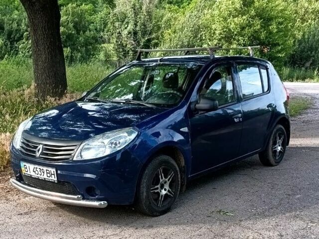 Синий Рено Сандеро, объемом двигателя 1.4 л и пробегом 279 тыс. км за 3650 $, фото 2 на Automoto.ua