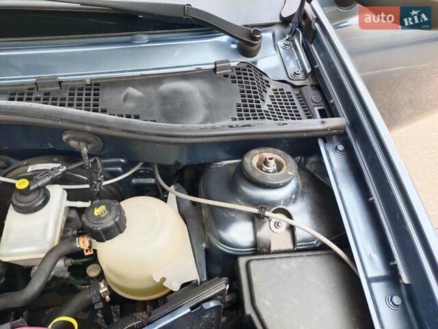 Синий Рено Сандеро, объемом двигателя 1.39 л и пробегом 261 тыс. км за 5200 $, фото 17 на Automoto.ua