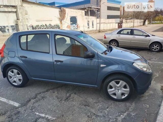 Синий Рено Сандеро, объемом двигателя 1.39 л и пробегом 261 тыс. км за 5200 $, фото 2 на Automoto.ua