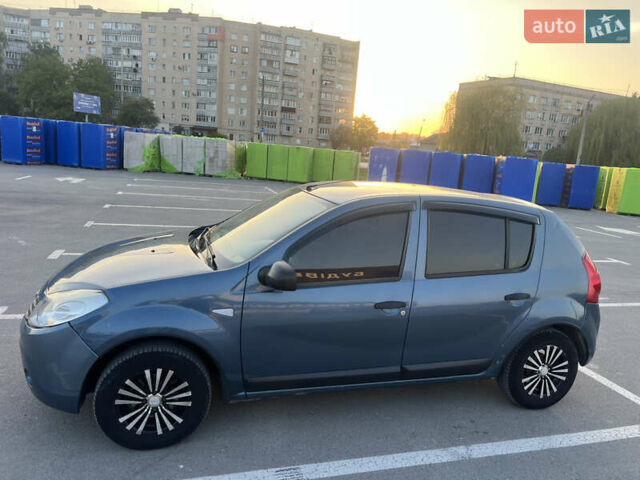 Синий Рено Сандеро, объемом двигателя 1.39 л и пробегом 230 тыс. км за 4500 $, фото 1 на Automoto.ua