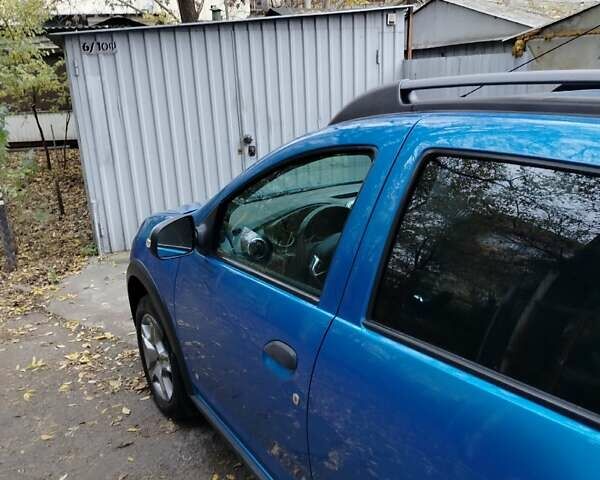 Синий Рено Сандеро, объемом двигателя 0.9 л и пробегом 100 тыс. км за 8700 $, фото 6 на Automoto.ua