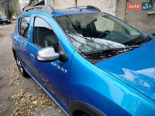 Синий Рено Сандеро, объемом двигателя 0.9 л и пробегом 100 тыс. км за 8700 $, фото 7 на Automoto.ua