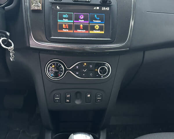 Синий Рено Сандеро, объемом двигателя 0.9 л и пробегом 87 тыс. км за 9500 $, фото 7 на Automoto.ua