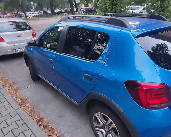 Синий Рено Сандеро, объемом двигателя 0.9 л и пробегом 65 тыс. км за 10000 $, фото 2 на Automoto.ua