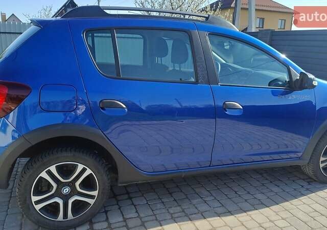 Синий Рено Сандеро, объемом двигателя 0.9 л и пробегом 49 тыс. км за 11500 $, фото 4 на Automoto.ua
