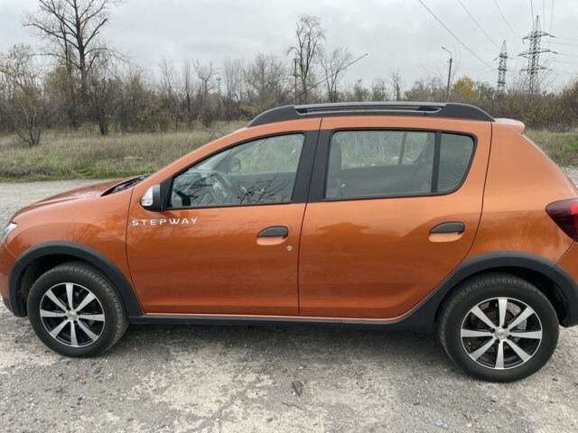 Оранжевый Рено Сандеро, объемом двигателя 1.5 л и пробегом 84 тыс. км за 11500 $, фото 2 на Automoto.ua