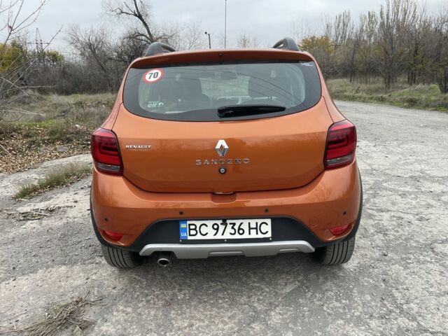 Оранжевый Рено Сандеро, объемом двигателя 1.5 л и пробегом 84 тыс. км за 11500 $, фото 1 на Automoto.ua