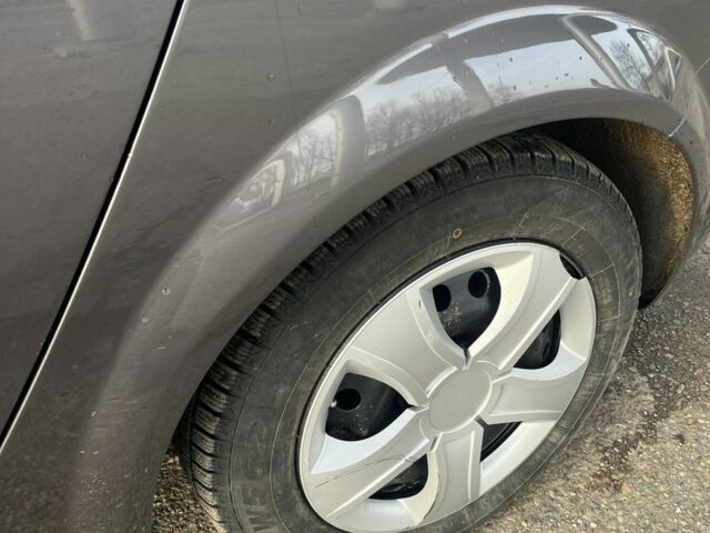 Серый Рено Сценик III, объемом двигателя 1.5 л и пробегом 295 тыс. км за 4600 $, фото 4 на Automoto.ua