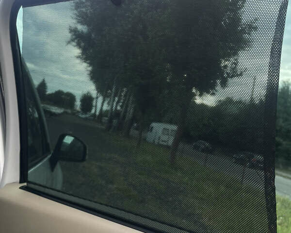 Рено Сценик 2010 в Луцке на Automoto.ua Белый Рено Сценик, объемом двигателя 1.5 л и пробегом 218 тыс. км за 7500 $, фото 23 на Automoto.ua