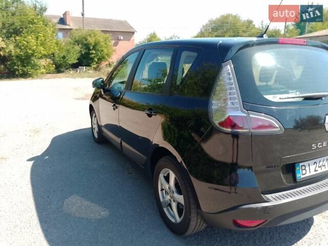 Черный Рено Сценик, объемом двигателя 1.5 л и пробегом 210 тыс. км за 7550 $, фото 2 на Automoto.ua