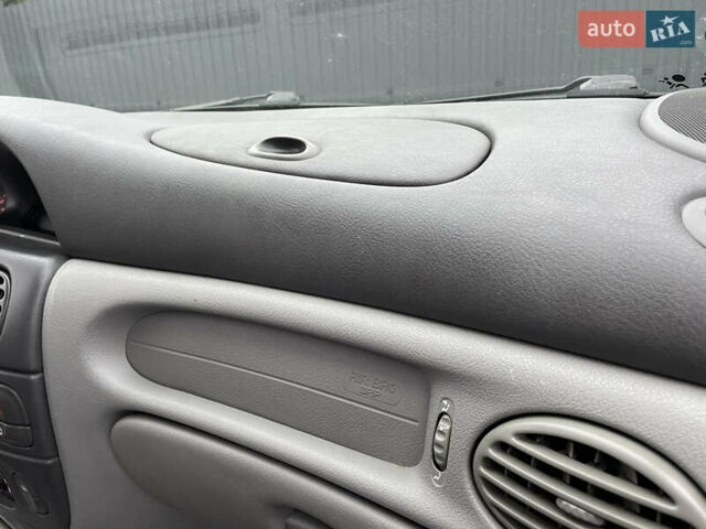 Рено Сценік 2003 у Дрогобичі на Automoto.ua Червоний Рено Сценік, об'ємом двигуна 1.6 л та пробігом 200 тис. км за 3750 $, фото 23 на Automoto.ua