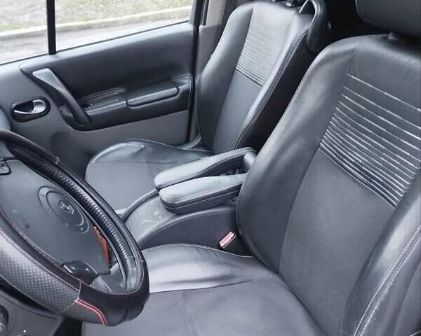 Красный Рено Сценик, объемом двигателя 1.6 л и пробегом 259 тыс. км за 4200 $, фото 23 на Automoto.ua