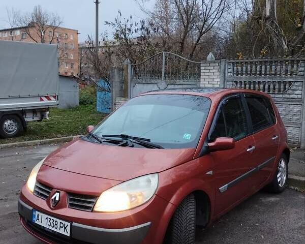Красный Рено Сценик, объемом двигателя 1.6 л и пробегом 259 тыс. км за 4200 $, фото 1 на Automoto.ua