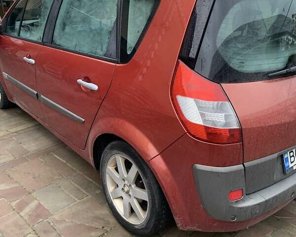 Красный Рено Сценик, объемом двигателя 1.6 л и пробегом 211 тыс. км за 5400 $, фото 1 на Automoto.ua