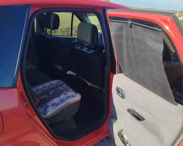 Красный Рено Сценик, объемом двигателя 1.6 л и пробегом 340 тыс. км за 4400 $, фото 10 на Automoto.ua