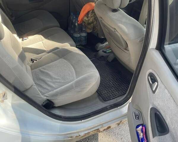 Серый Рено Сценик, объемом двигателя 1.6 л и пробегом 267 тыс. км за 2650 $, фото 1 на Automoto.ua