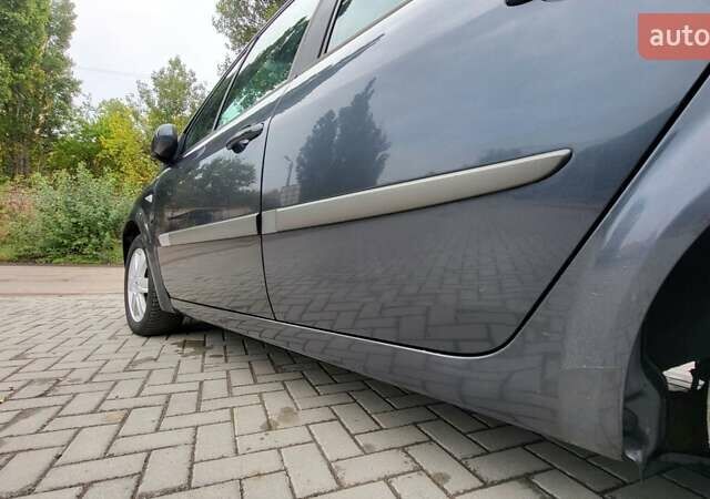 Серый Рено Сценик, объемом двигателя 1.6 л и пробегом 212 тыс. км за 5250 $, фото 9 на Automoto.ua