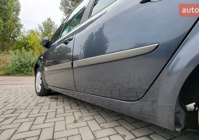 Серый Рено Сценик, объемом двигателя 1.6 л и пробегом 212 тыс. км за 5600 $, фото 5 на Automoto.ua