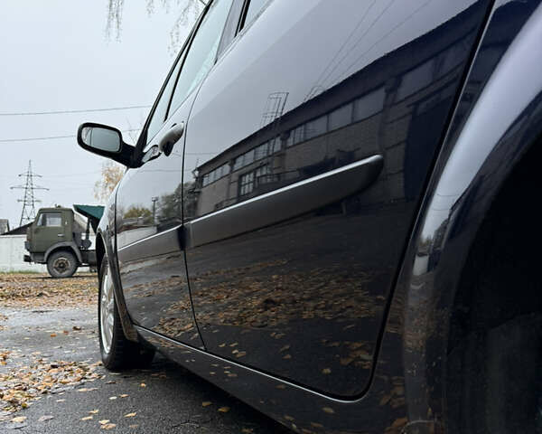 Синій Рено Сценік, об'ємом двигуна 1.6 л та пробігом 229 тис. км за 5999 $, фото 98 на Automoto.ua