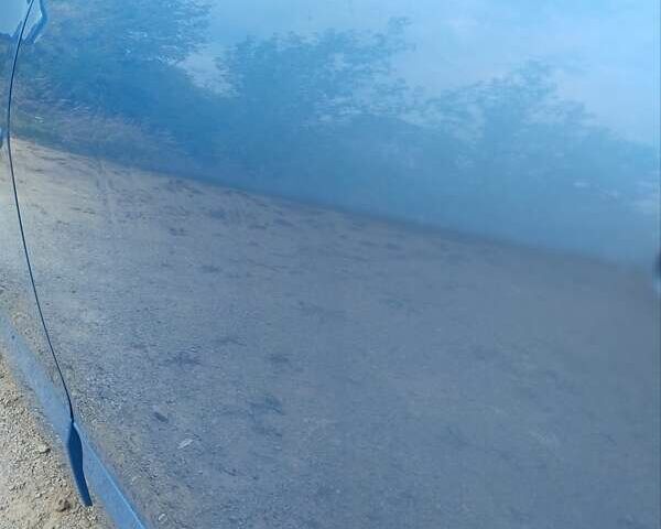 Синий Рено Сценик, объемом двигателя 1.46 л и пробегом 211 тыс. км за 9000 $, фото 2 на Automoto.ua