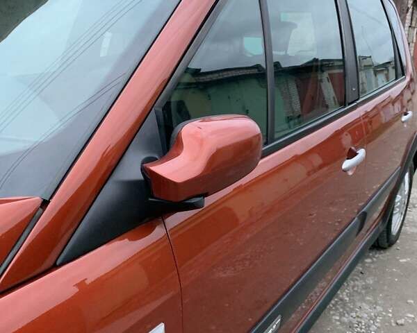 Помаранчевий Рено Сценік, об'ємом двигуна 2 л та пробігом 171 тис. км за 6250 $, фото 66 на Automoto.ua