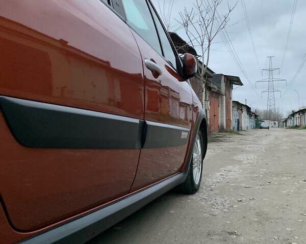 Помаранчевий Рено Сценік, об'ємом двигуна 2 л та пробігом 171 тис. км за 6250 $, фото 75 на Automoto.ua