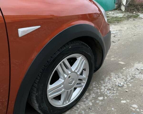 Помаранчевий Рено Сценік, об'ємом двигуна 2 л та пробігом 171 тис. км за 6250 $, фото 77 на Automoto.ua