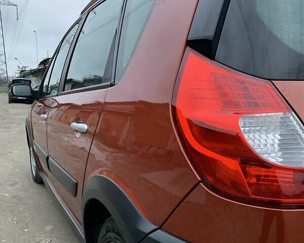 Помаранчевий Рено Сценік, об'ємом двигуна 2 л та пробігом 171 тис. км за 6250 $, фото 90 на Automoto.ua