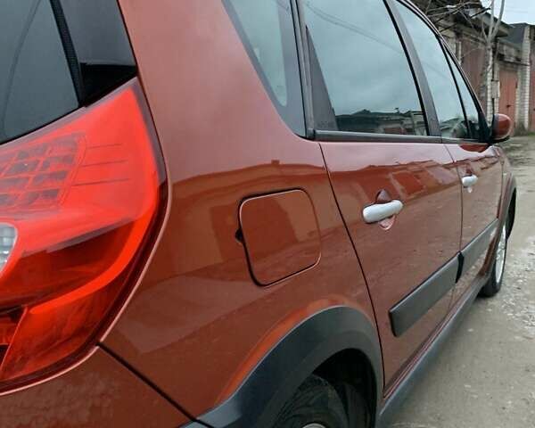 Помаранчевий Рено Сценік, об'ємом двигуна 2 л та пробігом 171 тис. км за 6250 $, фото 83 на Automoto.ua