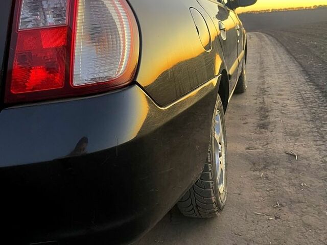 Черный Рено Симбол, объемом двигателя 1.4 л и пробегом 280 тыс. км за 2900 $, фото 5 на Automoto.ua