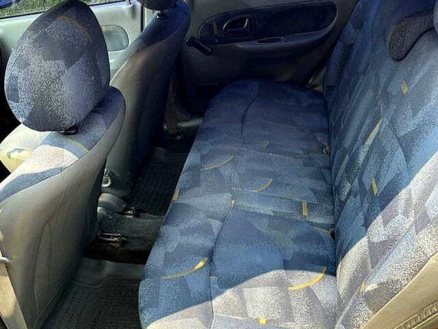 Красный Рено Симбол, объемом двигателя 1.4 л и пробегом 274 тыс. км за 2700 $, фото 4 на Automoto.ua