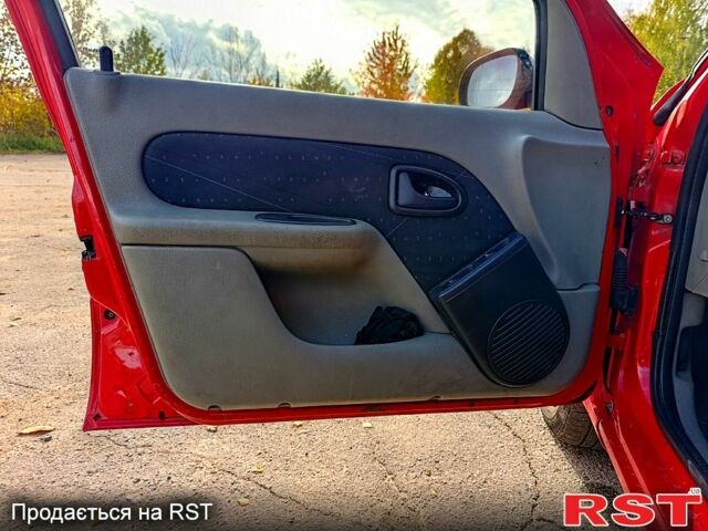 Красный Рено Симбол, объемом двигателя 1.4 л и пробегом 190 тыс. км за 3200 $, фото 7 на Automoto.ua