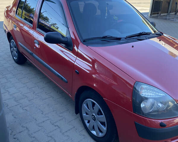 Червоний Рено Сімбол, об'ємом двигуна 1.39 л та пробігом 296 тис. км за 3000 $, фото 6 на Automoto.ua