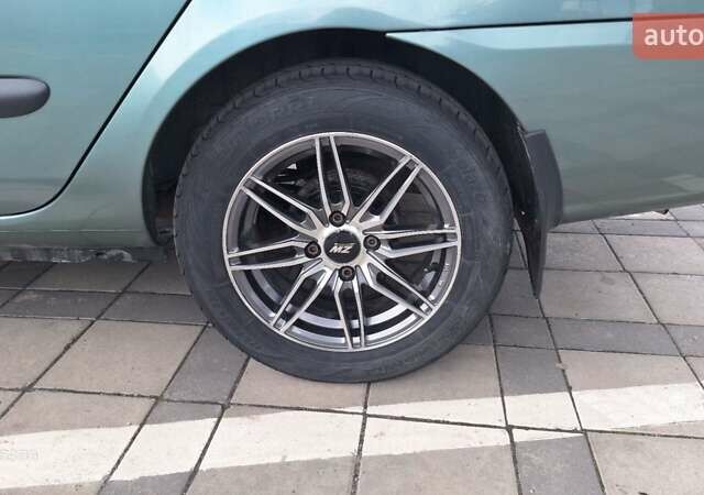 Зеленый Рено Симбол, объемом двигателя 1.4 л и пробегом 165 тыс. км за 4450 $, фото 10 на Automoto.ua