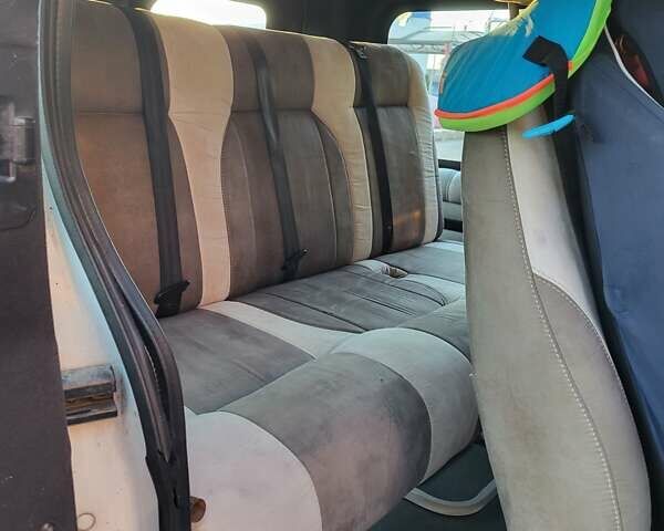 Білий Рено Трафік, об'ємом двигуна 2 л та пробігом 168 тис. км за 9600 $, фото 1 на Automoto.ua