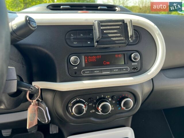 Черный Рено Твинго, объемом двигателя 1 л и пробегом 95 тыс. км за 6054 $, фото 7 на Automoto.ua