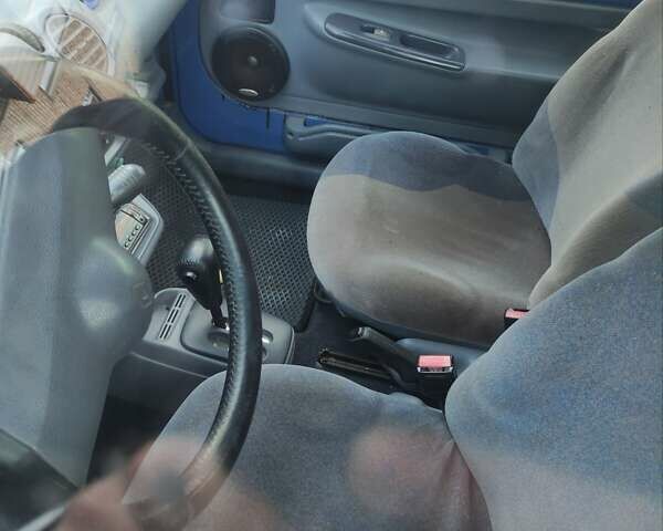 Синий Рено Твинго, объемом двигателя 1.14 л и пробегом 230 тыс. км за 2100 $, фото 2 на Automoto.ua