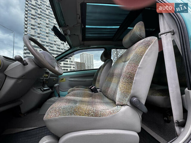 Зеленый Рено Твинго, объемом двигателя 1.2 л и пробегом 137 тыс. км за 3500 $, фото 58 на Automoto.ua