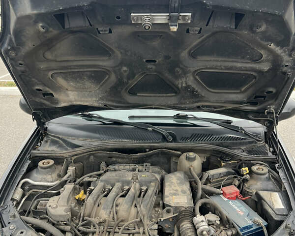 Черный Рено Clio Symbol, объемом двигателя 1.39 л и пробегом 179 тыс. км за 3700 $, фото 18 на Automoto.ua