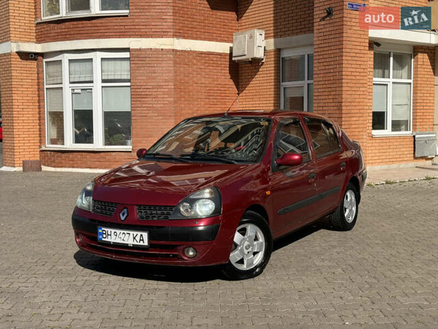 Красный Рено Clio Symbol, объемом двигателя 1.4 л и пробегом 421 тыс. км за 2777 $, фото 1 на Automoto.ua