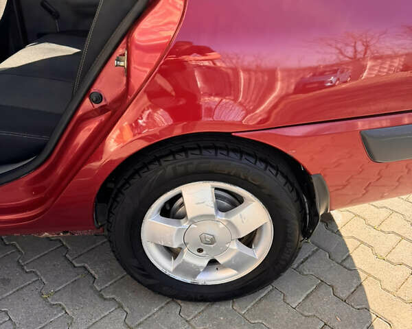 Красный Рено Clio Symbol, объемом двигателя 1.4 л и пробегом 421 тыс. км за 2777 $, фото 12 на Automoto.ua